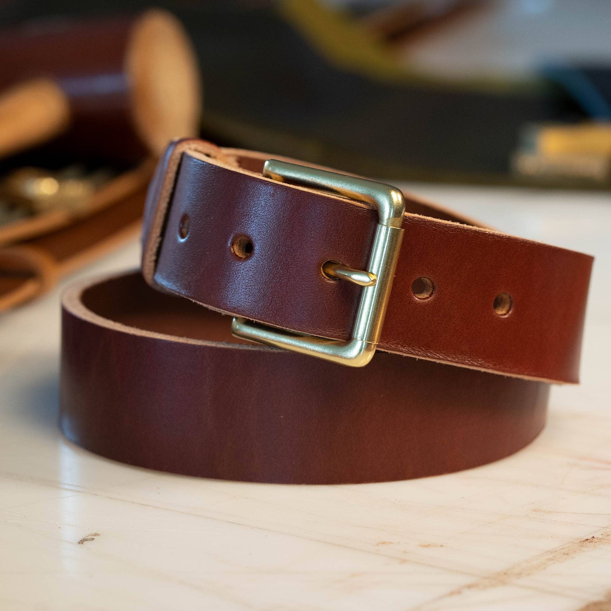 British Brown leather belt with a brass casual buckle.