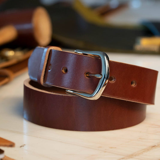 British Brown leather belt with a chrome semi dress buckle.